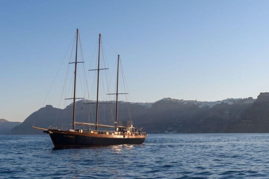 1-Day Boat Trip: Santorini Volcano, Thirassia & Oia Sunset - Palea Kameni and the hot springs swim: green water, strong smell
