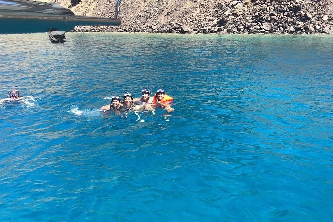 ALL-INCLUSIVE: Santorini Caldera Cruise with Greek Meal & Drinks - The First Swim Breaks: Red Beach and Mesa Pigadia in 30 Minutes