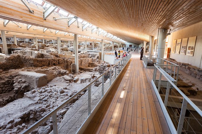 Archaeological Bus Tour To Akrotiri Excavations & Red Beach - Booking Notes: Where the Bus Picks You Up and How the 7 Hours Feel