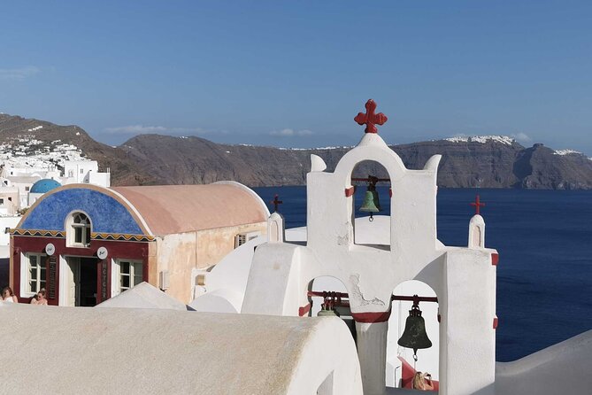 Authentic Santorini: A Self-Guided Audio Tour of Oia - Blue domes and postcard overlooks: start early to finish your walk