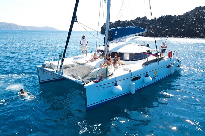 Best of Santorini Private Half-Day Catamaran Cruise with transfer and meal - Red Beach stop: volcanic color, quick time, and snorkeling worth it