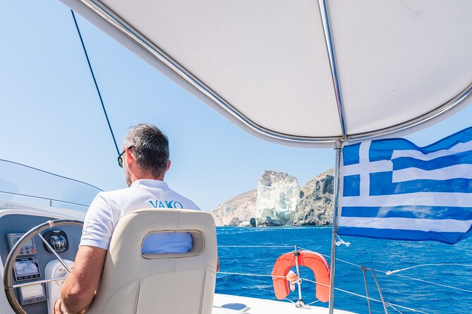 Best of Santorini Private Half-Day Catamaran Cruise with transfer and meal - White Beach: the quieter contrast with sea-only access