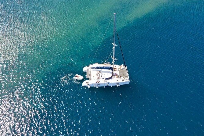 Best of Santorini Private Half-Day Catamaran Cruise with transfer and meal - Palea Kameni: short hot-springs time with sulfur water benefits
