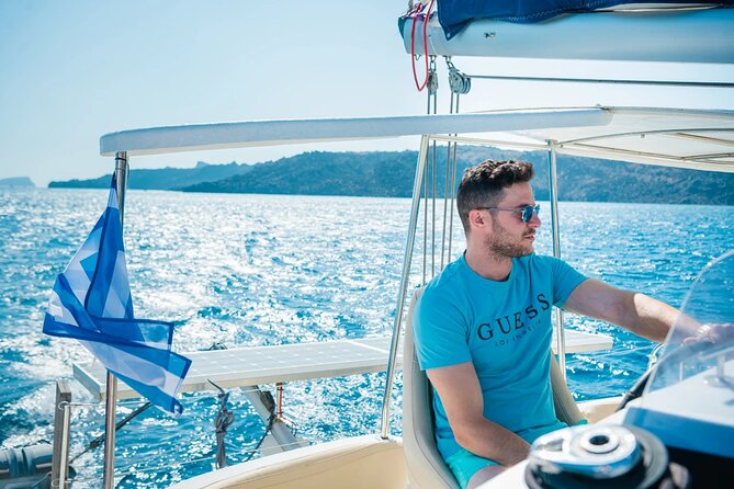 Best of Santorini Private Half-Day Catamaran Cruise with transfer and meal - Nea Kameni: the classic volcanic island visit with more time