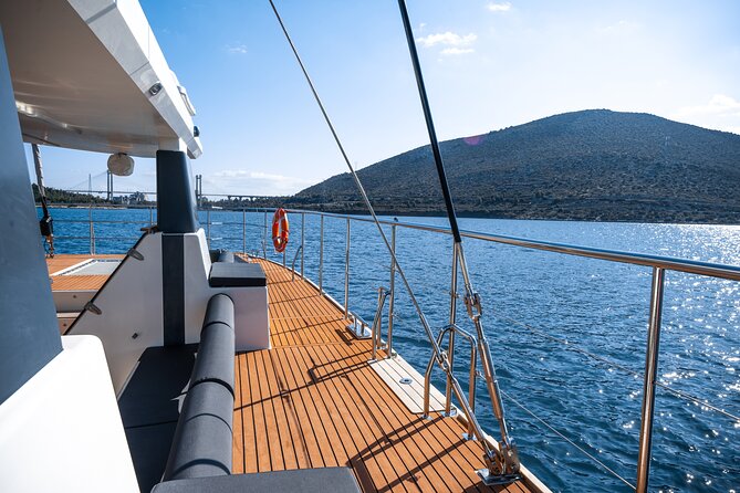 Comfort Max Catamaran Caldera Cruise with BBQ and Drinks - On Board Comfort: Music, Space, and the Reality of Bathrooms