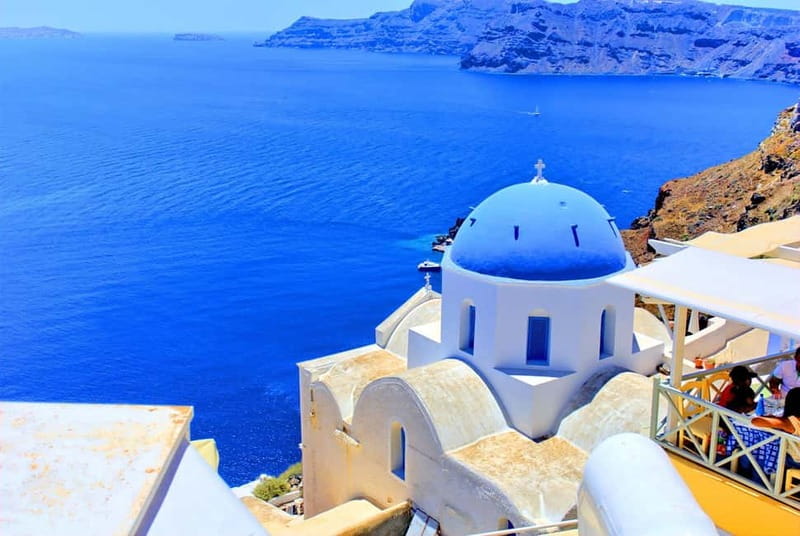 Crete: Santorini Day Trip with Fast Ferry Cruise - Oia free time: white houses, blue domes, and 1.5 hours