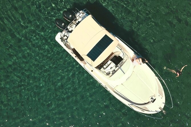 Explore Santorini and its volcanic wonders with Alex Private Boat - Palea Kameni and the volcano viewpoint from the water