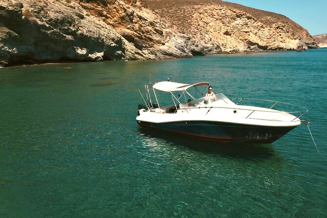 Explore Santorini and its volcanic wonders with Alex Private Boat - Nea Kameni hot springs: warm water, strong smell, and a fun mess