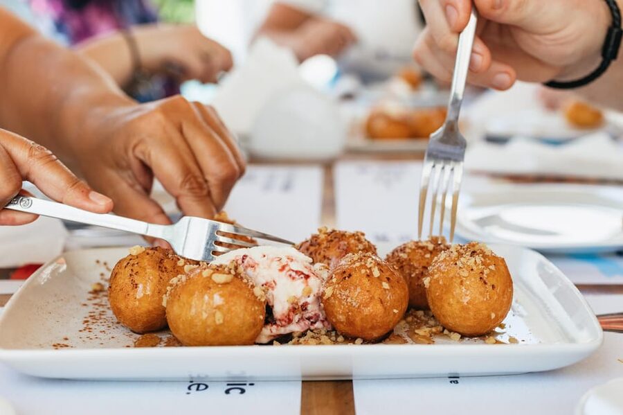 Fira: Guided Foodie Walking Tour with Tastings - The Blue-Domed Church Photo Moment and the First Mezes Stop