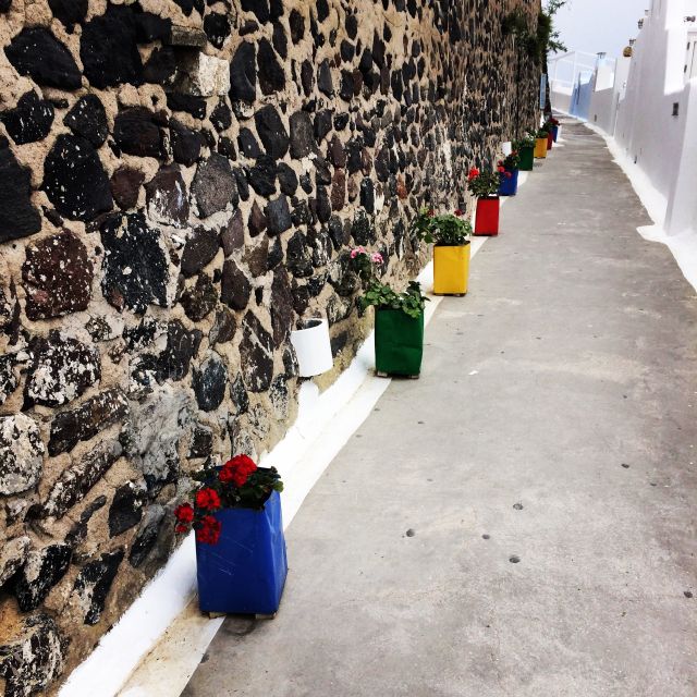Fira: Guided Foodie Walking Tour with Tastings - Organic Honey and Greek Sweets: Loukoumades and More
