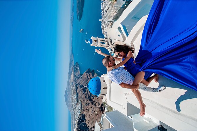 Flying Dress Photoshoot in Santorini - iconic views (WE DO MAGIC) - Meeting point in Fira and how to plan your arrival