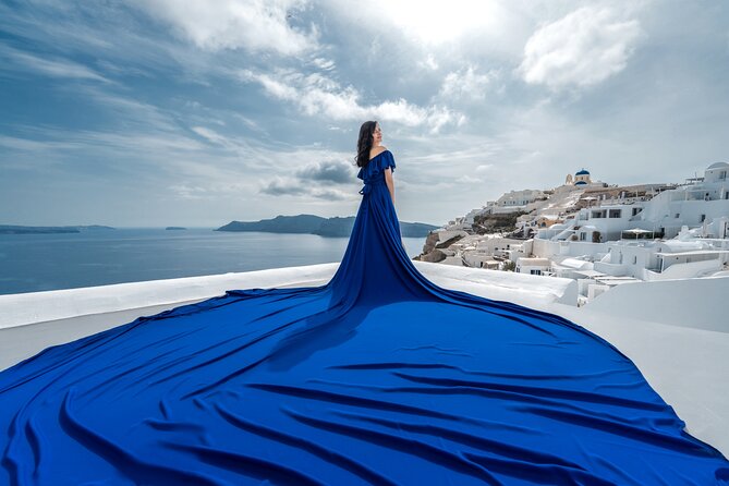 Flying Dress © Photoshoot in Santorini: Mr. President Package - Shoot day steps: how the gown gets adjusted and the photos start