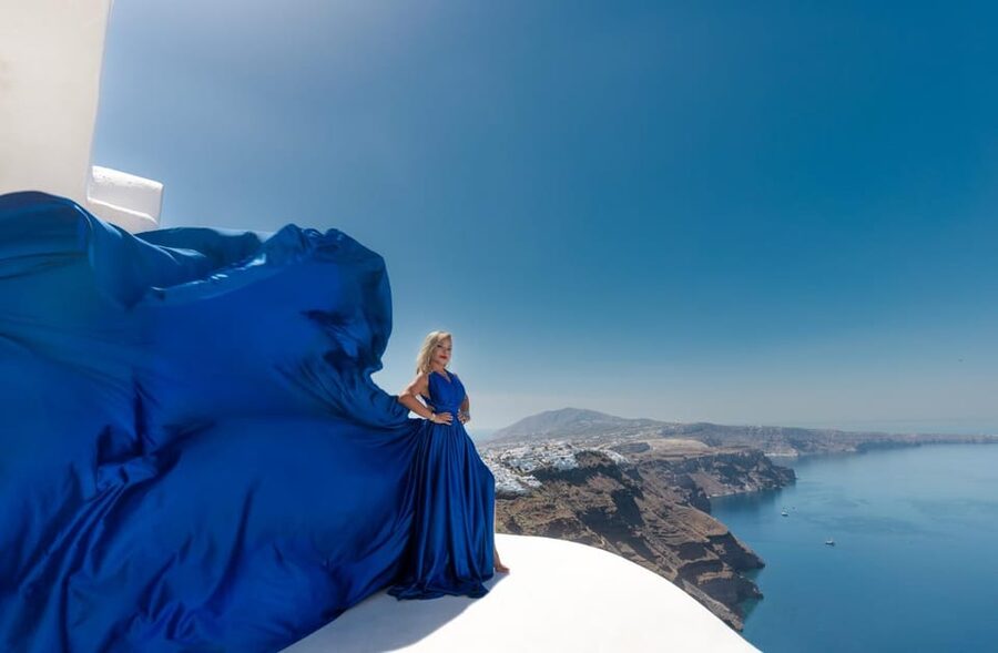 Flying dress Photoshoot in Santorini with Hotel Pickup - The Fira photo stop: a classic Santorini break in the middle