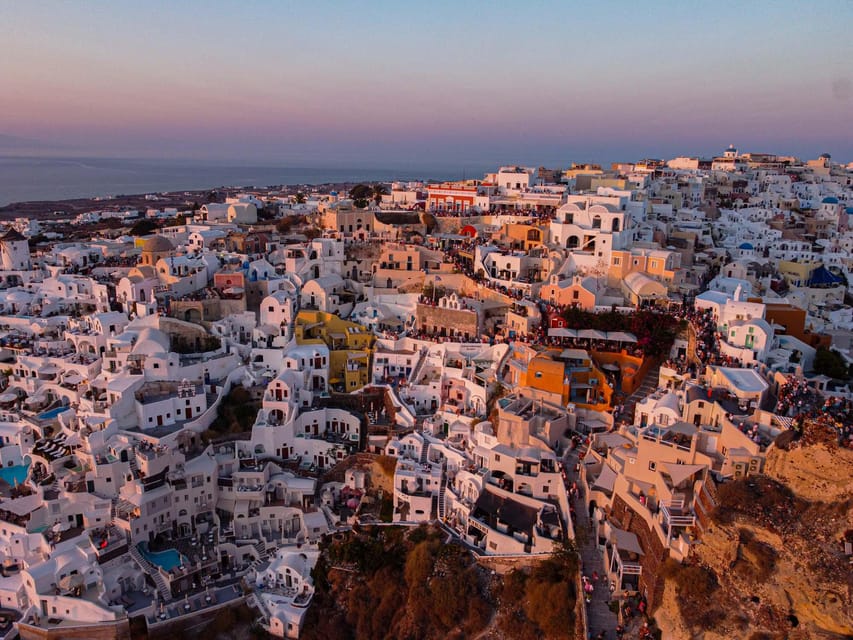 From Fira: Santorini Highlights Minibus Tour with Oia Sunset - Red Beach plus an ancient-lighthouse viewpoint stop