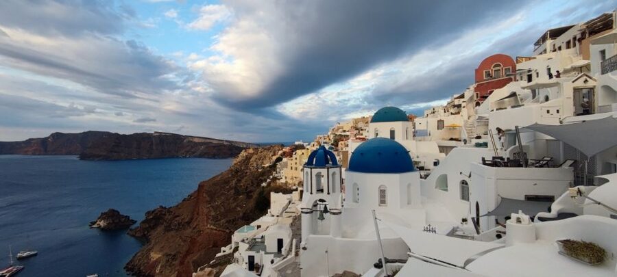 From Santorini: Guided Oia Morning Tour with Breakfast - Three Bells of Fira photo stop: a quick moment with big visual payoff