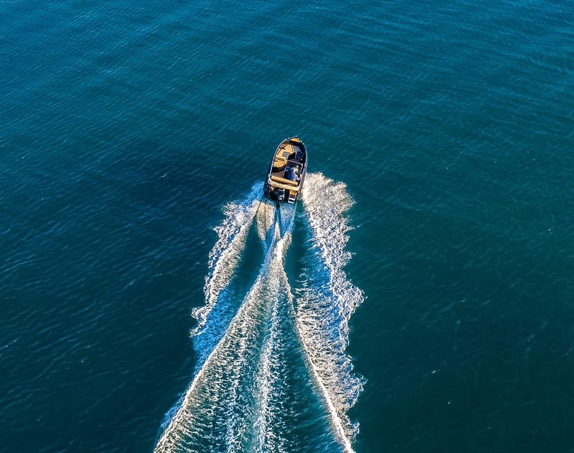 Full Day Santorini Boat Cruise -License Free- - Your 9-Hour Plan: Caldera Views, Volcano Hot Springs, and Beach Time