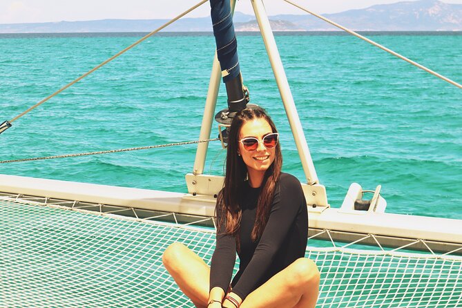 Full Day Santorini Catamaran Private Cruise with meal and transfer - The Faros lighthouse and Indian head rock spot: small stop, big payoff