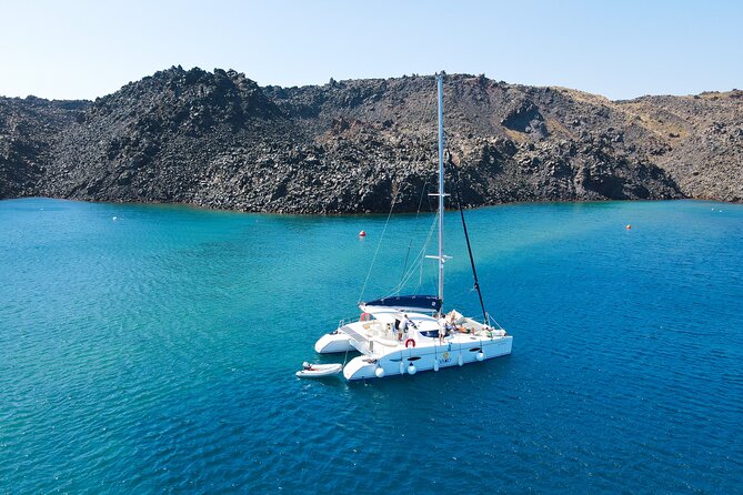 Full Day Santorini Catamaran Private Cruise with meal and transfer - Oia and the Fira old port: quick town time with caldera views