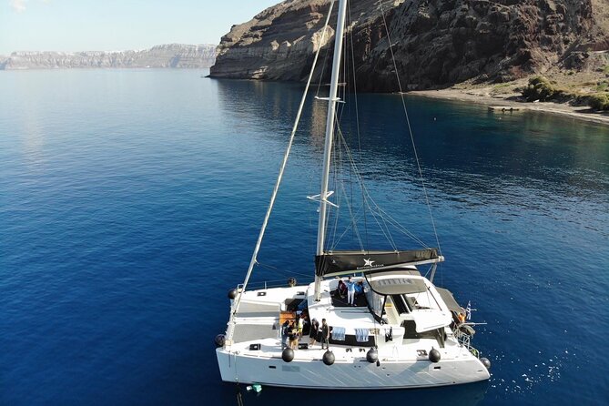 Half-Day Exclusive Catamaran Cruise in Santorini with Meal and Open Bar - Entering Santorini From the Water: Why This Catamaran Tempo Works
