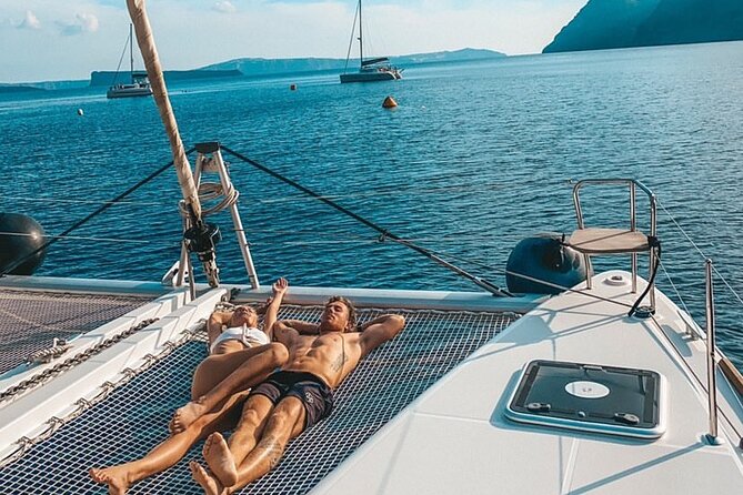 Half Day Premium Catamaran Cruise in Santorini including Oia - Crew names to look for and the service style onboard
