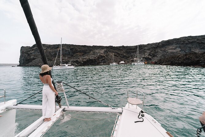 Half-Day Tailor-made Private Catamaran Cruise in Santorini - Oia from the water: the famous view, delivered with less stress