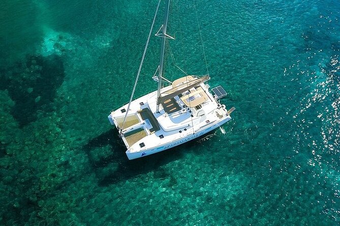 Island Hopping: Santorini Catamaran Charter Cruise with a skipper - Private Lagoon catamaran charter: why it works so well in Santorini