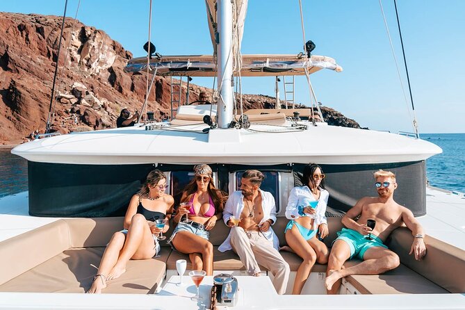Luxury Santorini Catamaran Cruise: Lunch, BBQ, Drinks, Transfers - Getting to Vlychada Marina and boarding smoothly