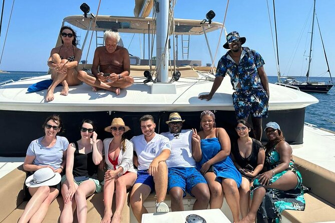 Luxury Santorini Catamaran Cruise: Lunch, BBQ, Drinks, Transfers - The crew and the feel of a small catamaran day