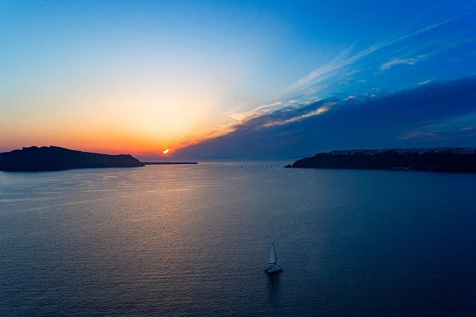 Luxury Sunset Cruise with Swim Stops, BBQ meals and Open Bar - The Route and Timing: Caldera Views, Volcanic Islands, and Hot Springs Scenery