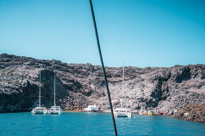 Majestic Catamaran Caldera Cruise with Snacks, Meal & Drinks - Pickup logistics and the crowd traffic reality
