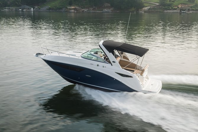 Motor Yacht (2020)Luxury Private Cruise Around Santorini - White Beach and the contrast with black sands
