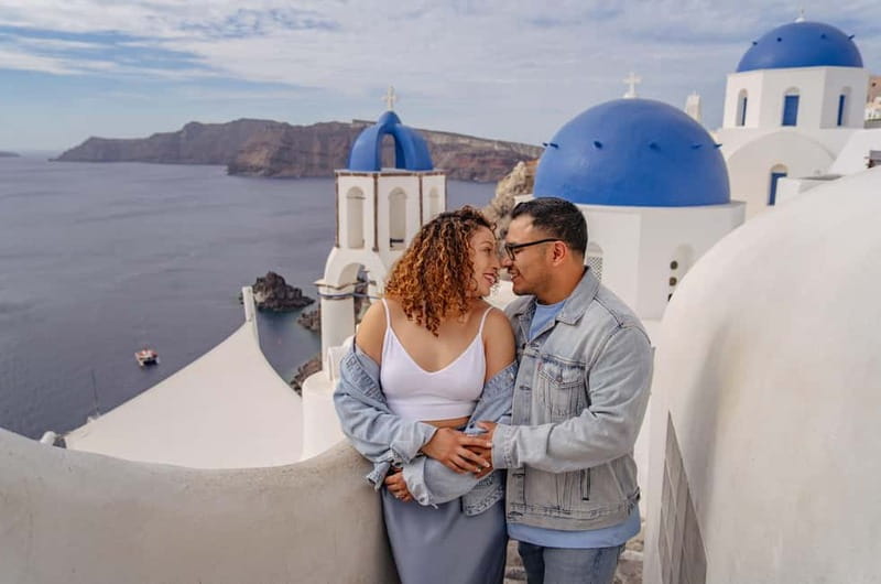 Oia: Couple Photoshoot Seprate Entrance to Blue Dome - The Blue Dome angle: why this spot is worth prioritizing