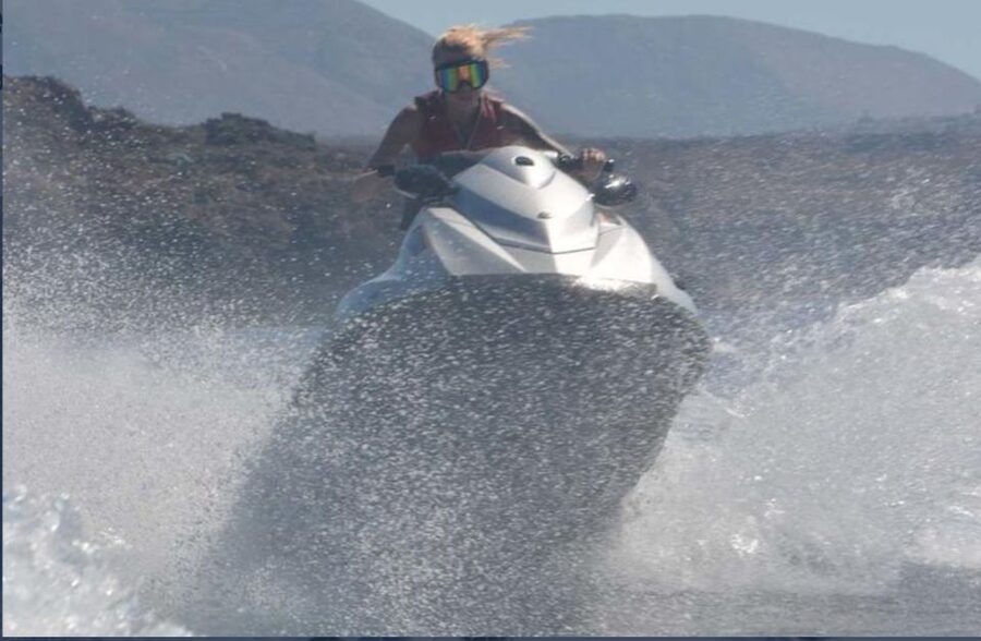 Perivolos: Private South Coast Discovery on a Jet Ski - Black Mount sea caves and secluded coves: seeing Santorini from the water