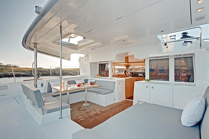 Premium Santorini Private Day Tour Elba 45, BBQ, drinks, transfer - Red Beach: short photo-and-swim time for the iconic look