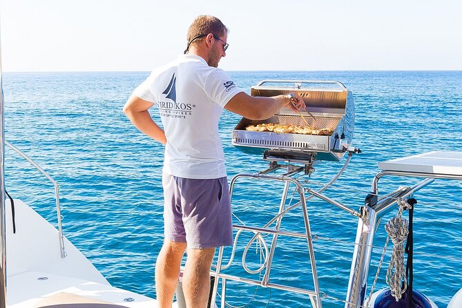 Premium Small-Group Catamaran Cruise with BBQ, Open Bar, Transfer - Nea Kameni Volcanic Views: The Caldera Story Told While You’re Sailing