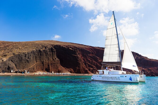 Premium Small-Group Catamaran Cruise with BBQ, Open Bar, Transfer - Red Beach and White Beach Photo Stops: Stunning Colors, No Swimming, No Drop-Off