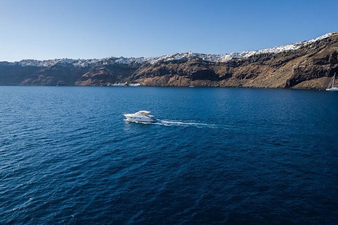 Private all included yacht Tour in Santorini - Sailing Past Fira, Firostefani, Imerovigli, and the Old Port
