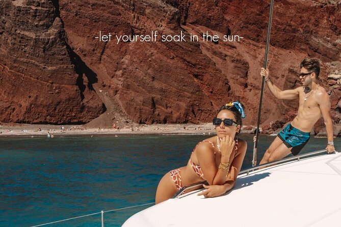 Private All Inclusive Day Cruise with Full Greek Lunch - Red Beach in Santorini: iron-rich sand and a quick swim break