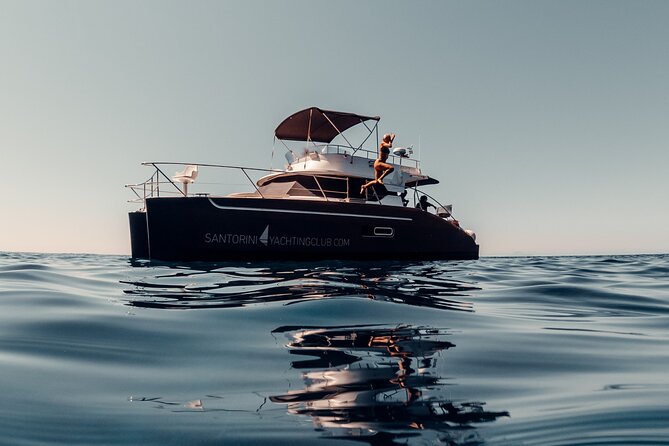 Private Caldera Cruise with Power Catamaran ENJOY incl. Meal & Drinks - Stop 1: Santorini Volcano hot springs swim (about 30 minutes)