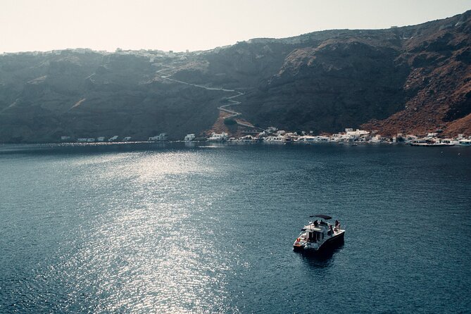 Private Caldera Cruise with Power Catamaran ENJOY incl. Meal & Drinks - Snorkeling gear, SUP, and the deck-time most people forget to plan