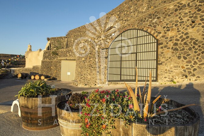 Private Half Day Tour with Wine Tasting in Santorini - Santo Wines tasting: sunset over the caldera as a built-in finale