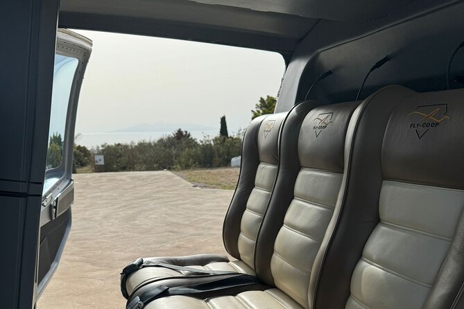 Private Helicopter Tour Santorini 20 minutes - up to 4 passengers - Oia at Golden Hour Style: Town Patterns and Sunset Positioning