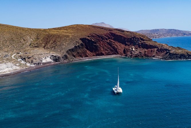 Private Luxury Caldera Cruise with a rich BBQ meal and Open Bar! - The best part: snorkeling gear and real swim time