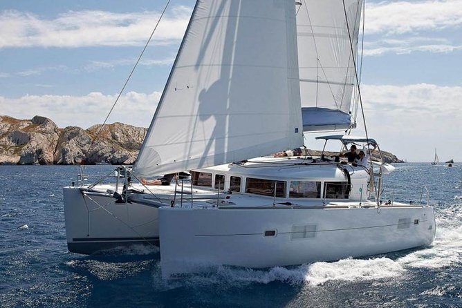 Private Luxury Santorini Catamaran Cruise with Port Pickup - Red Beach swim: the color show (with real limits)