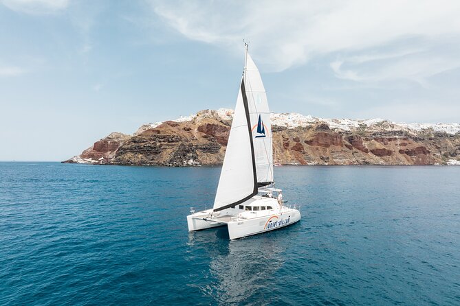 Private Morning Tour Lagoon 400-380 Sailing in Santorini ,lunch, drink, transfer - From Nea Kameni to the Hot Springs: the volcano swim you’ll remember