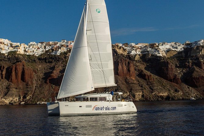 Private Morning Tour Lagoon 400-380 Sailing in Santorini ,lunch, drink, transfer - White Beach for swimming and snorkeling: where the schedule gives you time
