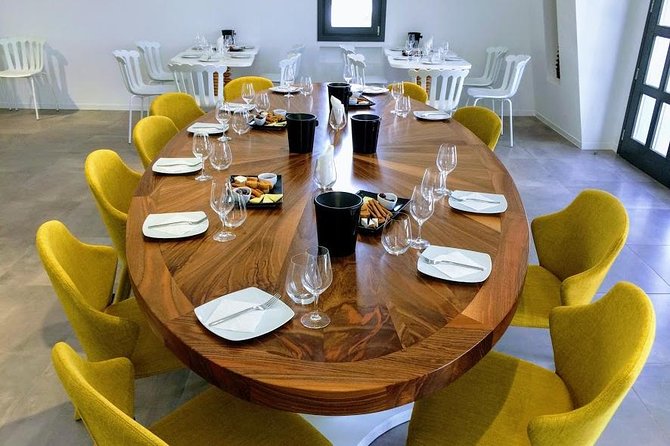 Private Santorini History and Wine Tasting 5-Hour Tour - Artemis Karamolegos: modern equipment, volcanic terroir, and 1952 roots