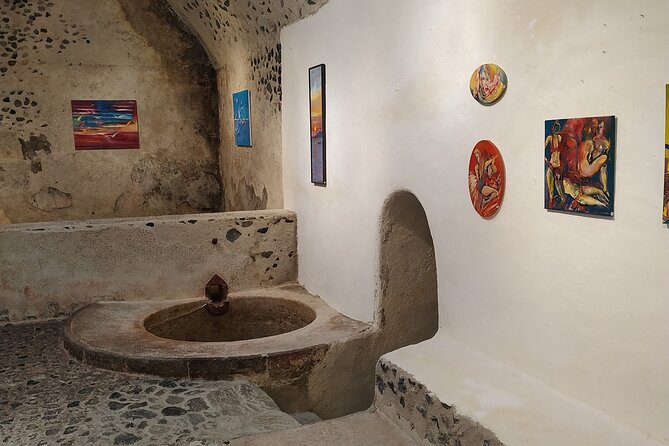 Private Santorinian Wine Tour - Stop 1: Art Space in Exo Gonia’s pumice-rock winery chambers
