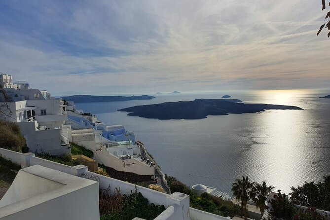 Romantic Private Day Tour in Santorini - Perissa Black Sand Beach: Sunbeds, Beach Bars, and a Real Reset