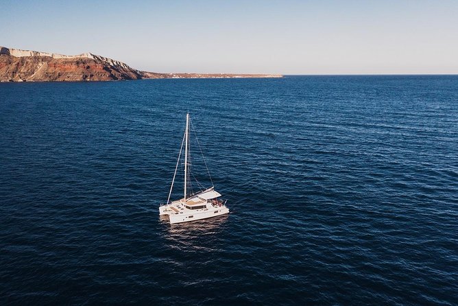 Romantic Sunset Catamaran Caldera Cruise incl. Meal & Drinks - Small-group feel with a real-world group-size check